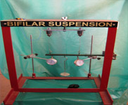 Hinged bar suspended by two wires of different materials (Bifilar suspension system)